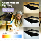 26-inch black LED desk lamp with clamp showing three color temperature modes from warm to cool white for customizable task lighting.